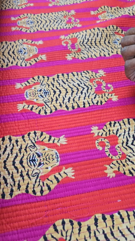 Close-up of tiger stripe quilted fabric on the longline yoga and mahjong carry bag