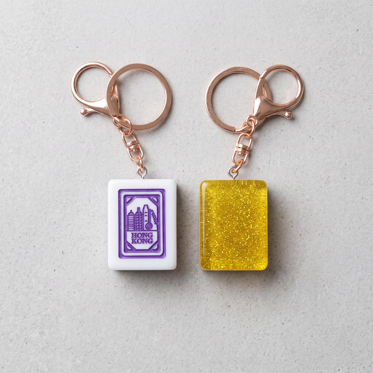 Hong Kong Mahjong Tile Keychain – Purple Engraved Resin Charm